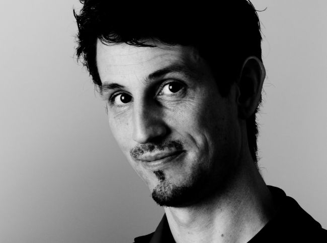 Monochrome photo of Greg Felton