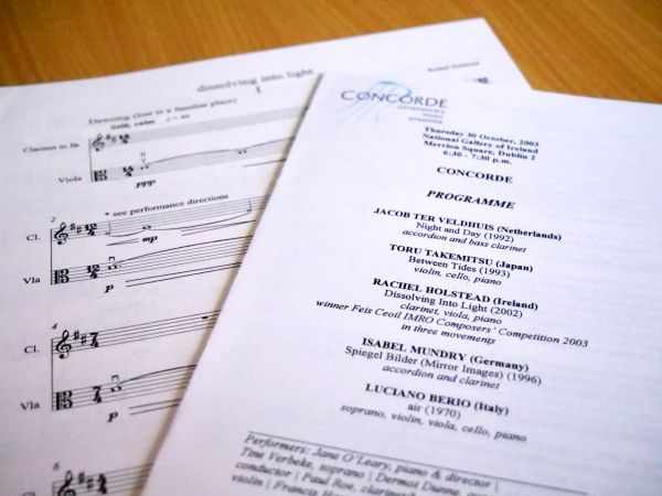 The opening page of a music score alongside a concert programme