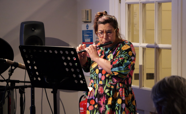Flautist Lina Andonovska playing the piccolo at CMC.
