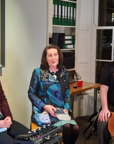 Linda O'Shea Farren, Projects, programmes and events manager with CMC Colleagues Anselm McDonnell, composer and Martin Johnson, cellist at the Dublin launch of Anselm's debut album 'Light of Shore', hosted by CMC at the CMC Christmas Party 2021.